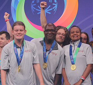 Team Kentucky Athletes on Podium with medals